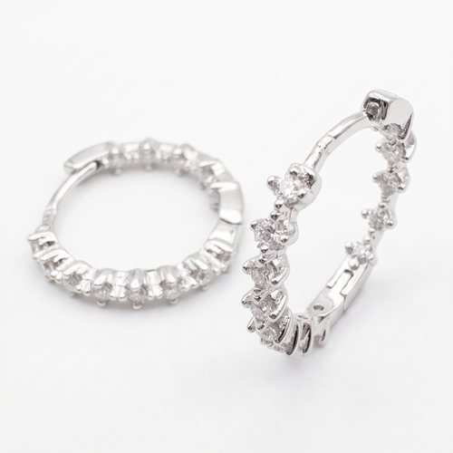 AnastasiaRio inside-out moissanite hoop earrings in 925 sterling silver, on white