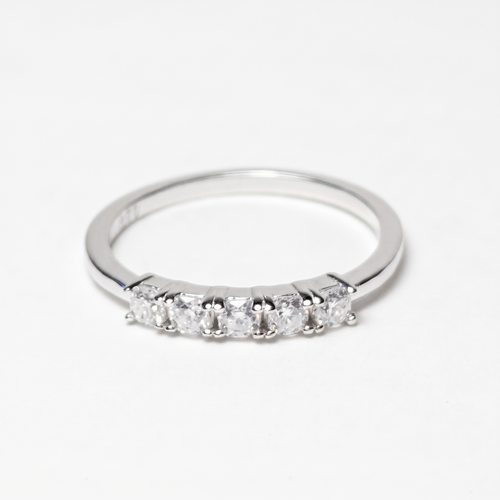 Five-stone moissanite ring, front view on white
